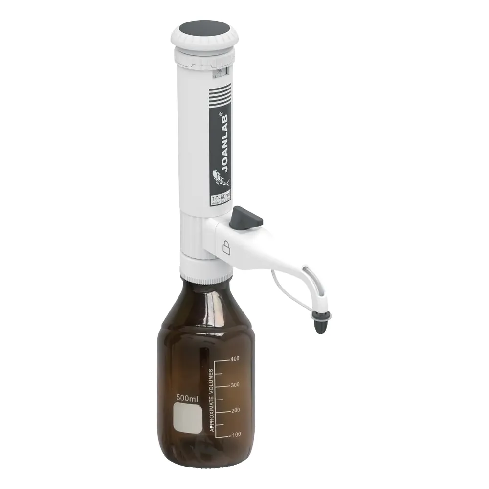 Dispenser mounted on an amber bottle, with the discharge nozzle
